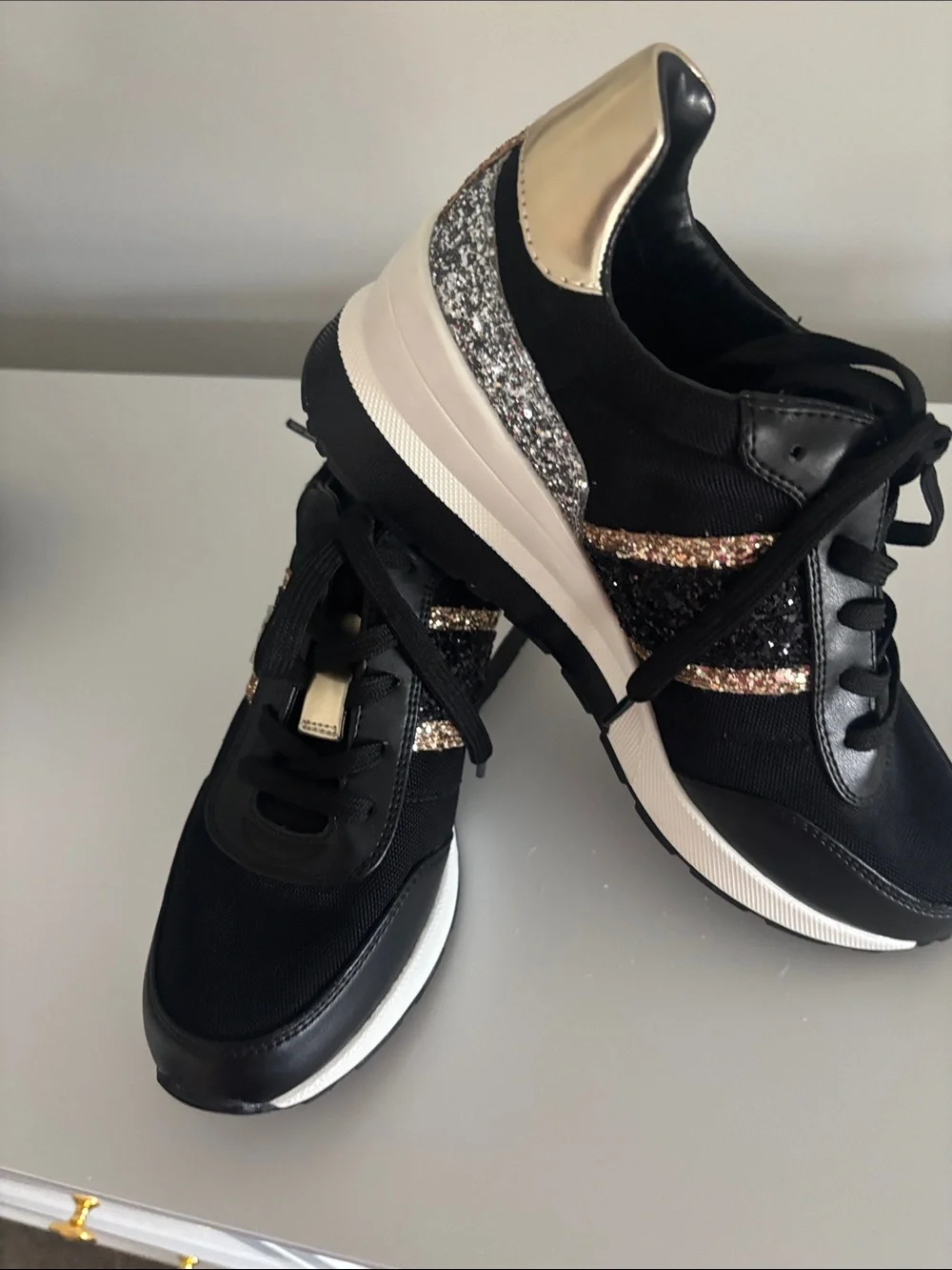 Michael Kors Black Sneakers with Gold Accents